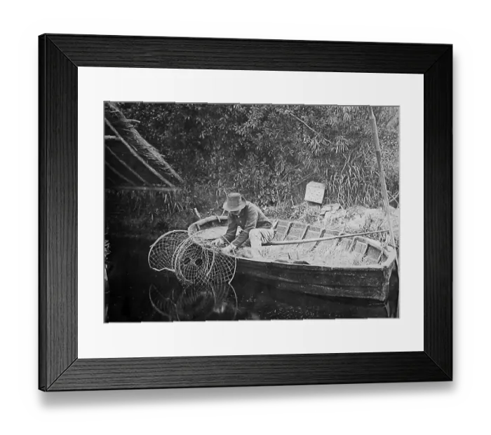 Framed Print : Norfolk reed boat house and eel fisherman Victorian period Framed Print : Norfolk reed boat house and eel fisherman Victorian period