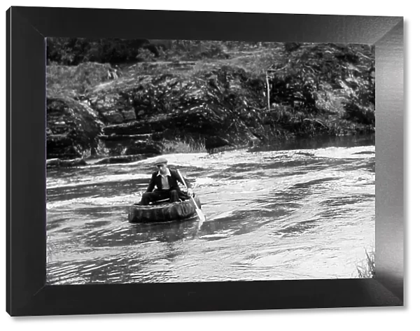 Coracle on River Teifi at Cenarth, Wales