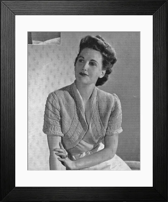 Framed Print : Model wearing a knitted bolero jacket. Date: 1940 Framed Print : Model wearing a knitted bolero jacket. Date: 1940