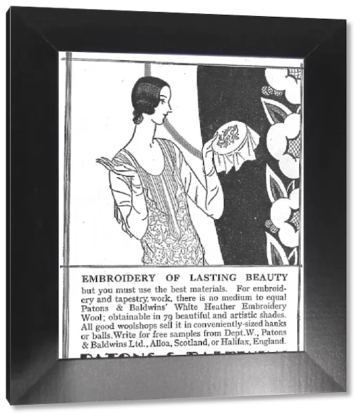 Advert for Patons and Baldwin's tapestry wools, with a lady admiring her work Date: 1920s