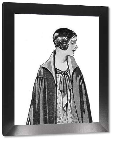Illustration of a cape worn over a short-skirted dress. Date: 1920s