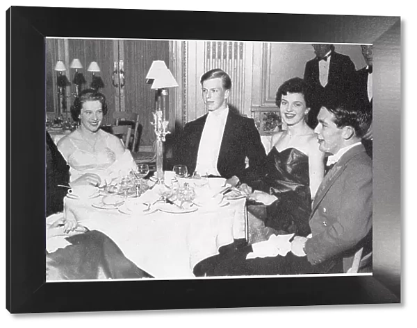 A group at the Trinity College Beagles Ball, held at the Hyde Park Hotel in London in the spring of 1956. From left: Miss Jennifer Bott, Mr Robert Philipson-Stowe, Miss Dillys Le Fleming, Mr. A. W. Wiggin, Miss Belinda Stobart and Mr. R. D