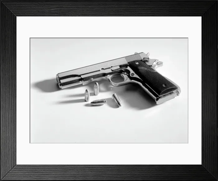 Framed Print : Browning M1911.45 calibre automatic pistol Framed Print : Browning M1911.45 calibre automatic pistol