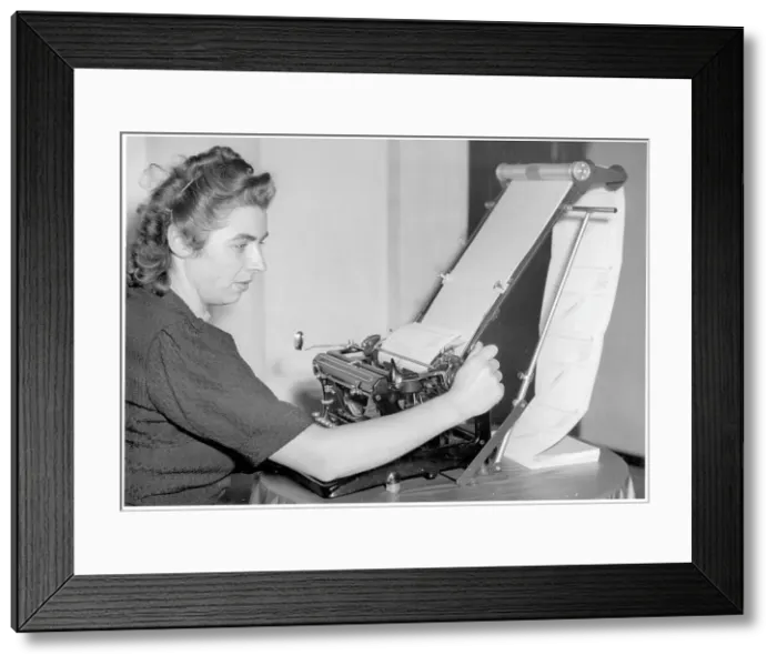 Framed Print : A form feeding machine on a typewriter Framed Print : A form feeding machine on a typewriter