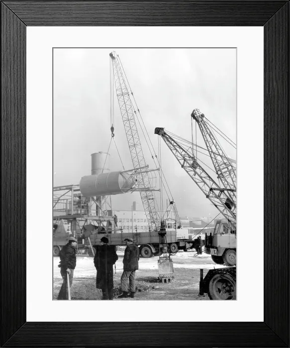 Framed Print : Erecting a grain silo using cranes Framed Print : Erecting a grain silo using cranes
