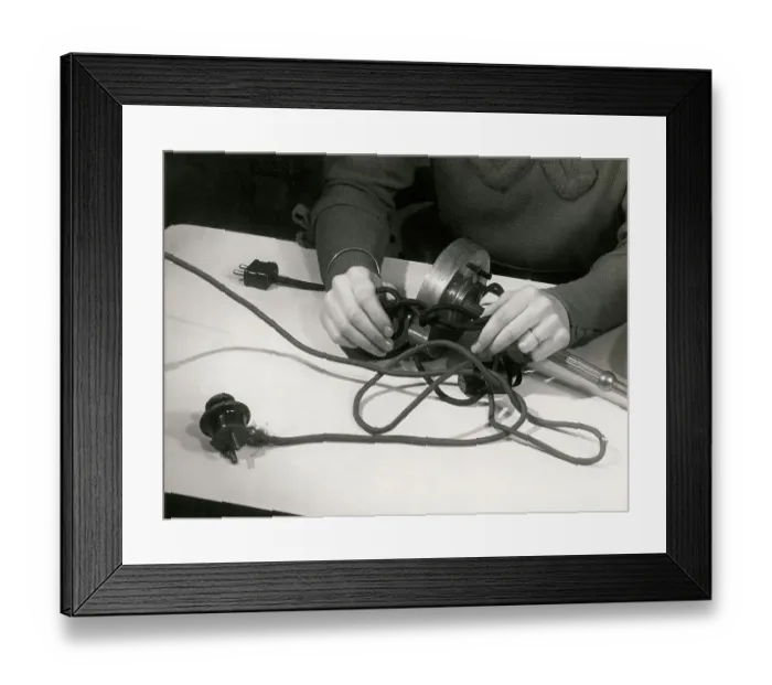 Framed Print : This sort of thing is bad for electric flexes. The fine strands of wire inside the rubber insulator will break an ultimately cause a breakdown or even electrocution. Date: 1930s Framed Print : This sort of thing is bad for electric flexes. The fine strands of wire inside the rubber insulator will break an ultimately cause a breakdown or even electrocution. Date: 1930s