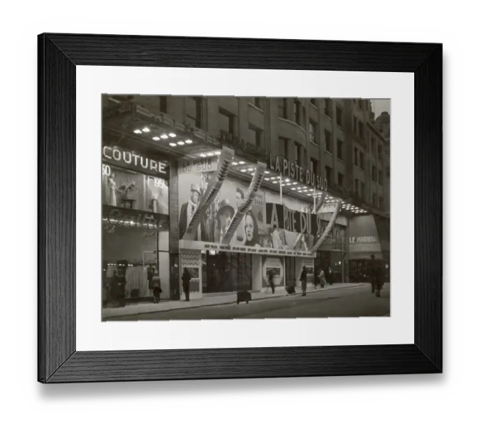 Framed Print : A cinema on the Champs Elysees, Paris, France, where the film La Piste du Sud is showing. Date: 1938 Framed Print : A cinema on the Champs Elysees, Paris, France, where the film La Piste du Sud is showing. Date: 1938