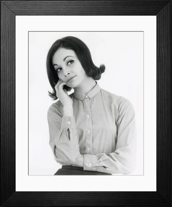 Framed Print : Head and shoulders portrait of a woman lost in thought or daydreaming. Date: mid 1960s Framed Print : Head and shoulders portrait of a woman lost in thought or daydreaming. Date: mid 1960s
