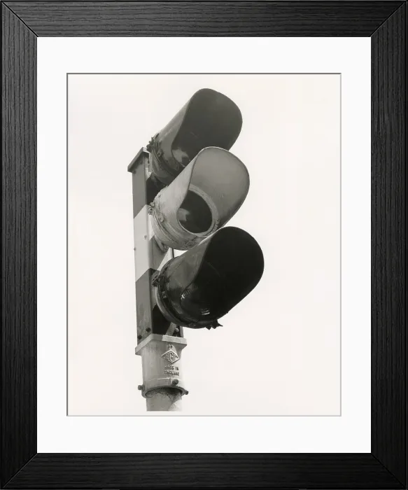 Framed Print : A set of traffic lights, looks like they're green but it's a black and white photo. Date: late 1960s Framed Print : A set of traffic lights, looks like they're green but it's a black and white photo. Date: late 1960s