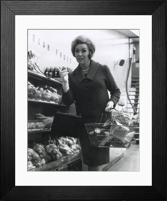 Framed Print : What she wants must be over there. Date: late 1960s Framed Print : What she wants must be over there. Date: late 1960s