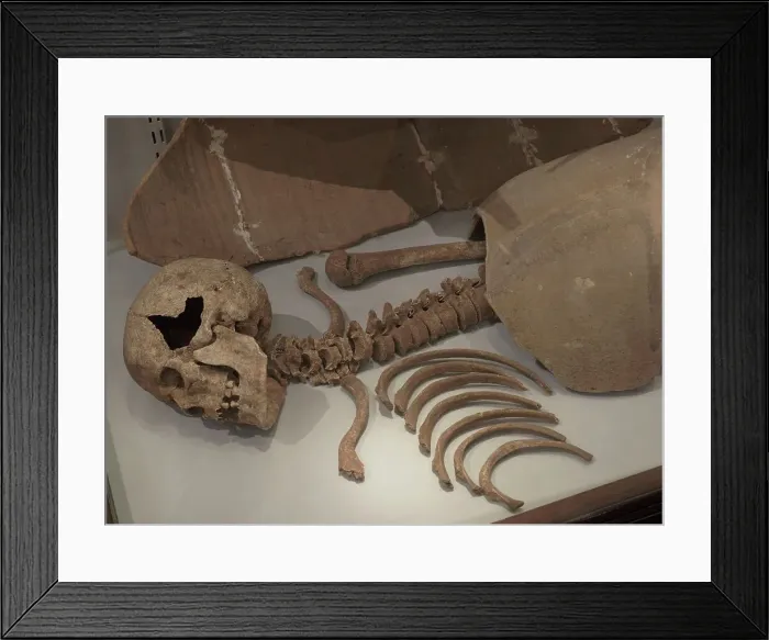 Framed Print : Man buried beneath the two halves of an amphora Framed Print : Man buried beneath the two halves of an amphora