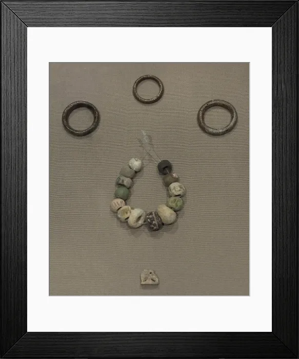 Framed Print : Copper hair-rings and ring, beads and an amulet Framed Print : Copper hair-rings and ring, beads and an amulet