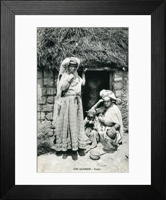 Framed Print : Two Algerian Women (and a young child) outside their home Framed Print : Two Algerian Women (and a young child) outside their home