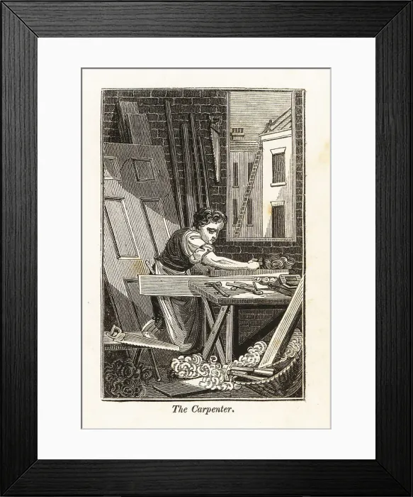 Framed Print : The carpenter planing a plank of wood in a workshop Framed Print : The carpenter planing a plank of wood in a workshop