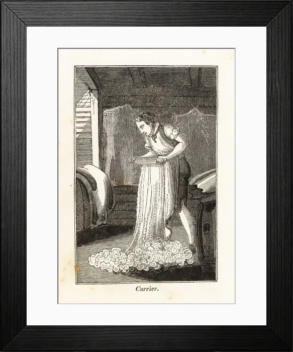 Framed Print : Currier in apron shaving an animal hide with a knife Framed Print : Currier in apron shaving an animal hide with a knife