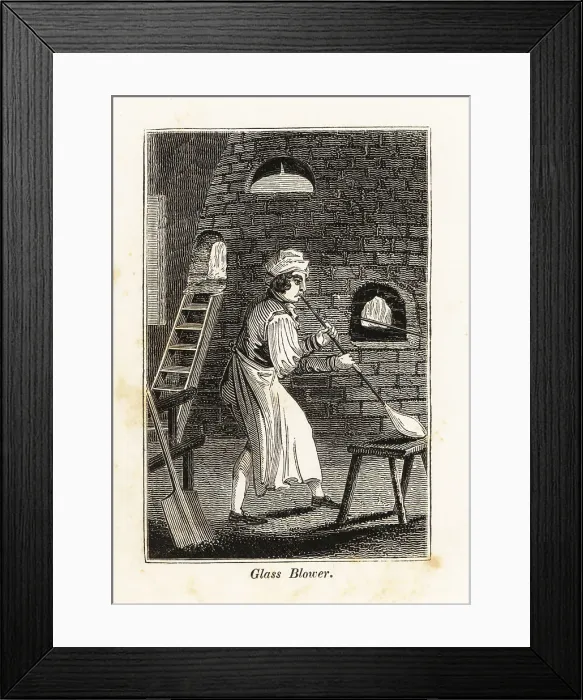 Framed Print : Glass-blower in apron blowing a glass bottle in a glass factory Framed Print : Glass-blower in apron blowing a glass bottle in a glass factory