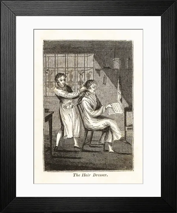 Framed Print : Hairdresser using a comb to brush a customer's hair in a barbe Framed Print : Hairdresser using a comb to brush a customer's hair in a barbe