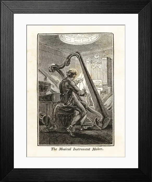 Framed Print : Man stringing a harp in a music workshop Framed Print : Man stringing a harp in a music workshop
