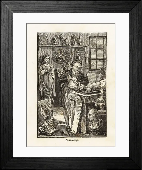 Framed Print : Sculptor in apron carving a statue in a workshop Framed Print : Sculptor in apron carving a statue in a workshop