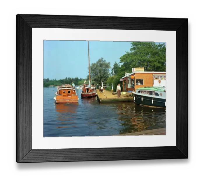 Framed Print : River Yare, Norfolk Broads - Riverside stores at Brundall Framed Print : River Yare, Norfolk Broads - Riverside stores at Brundall