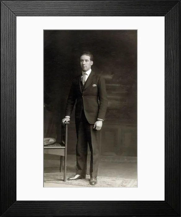Framed Print : Smart young man posing for a Studio photograph Framed Print : Smart young man posing for a Studio photograph