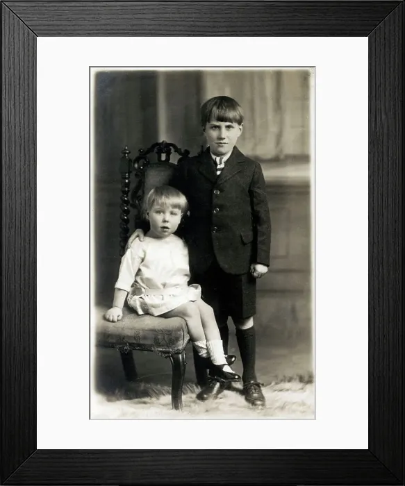Framed Print : Young Boy and younger sister - studio portrait photograph Framed Print : Young Boy and younger sister - studio portrait photograph