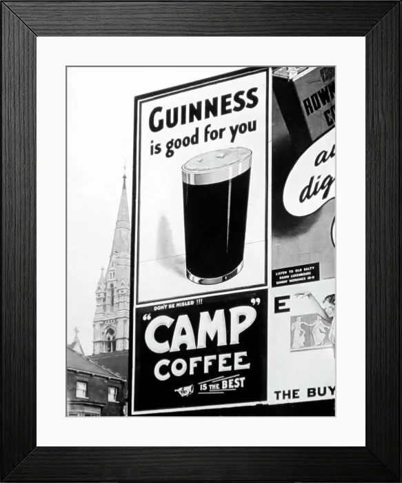 Framed Print : Advertising hoarding for Guinness and Camp Coffee