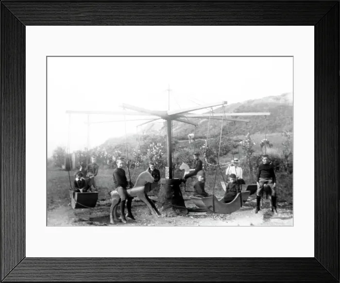 Framed Print : A village fair children's roundabout, Victorian period Framed Print : A village fair children's roundabout, Victorian period