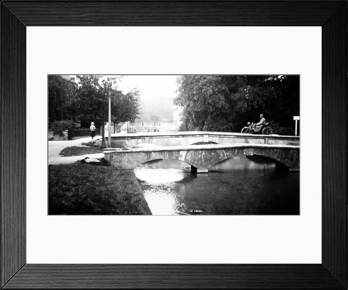 Framed Print : Motorcyclist on a bridge in Bourton on the Water Framed Print : Motorcyclist on a bridge in Bourton on the Water