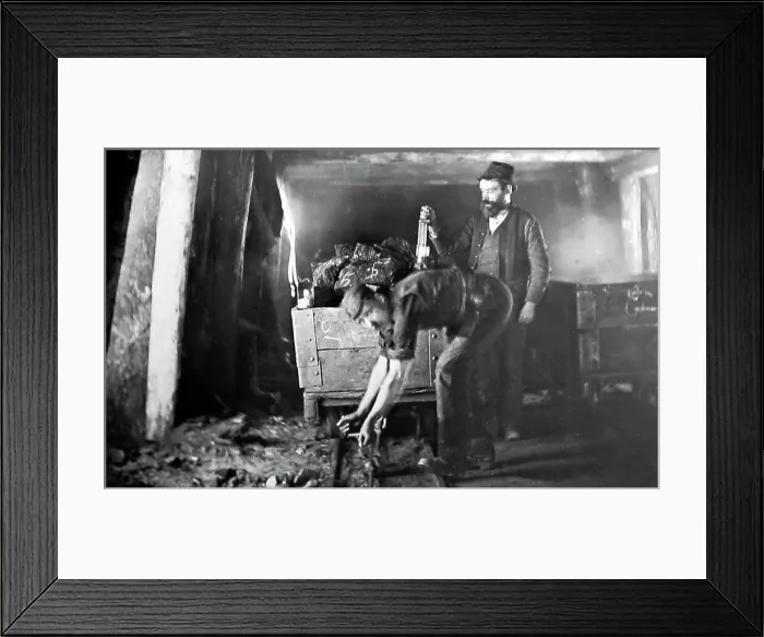 Framed Print : Checking the haulage line on a coal wagon in a coal mine Framed Print : Checking the haulage line on a coal wagon in a coal mine