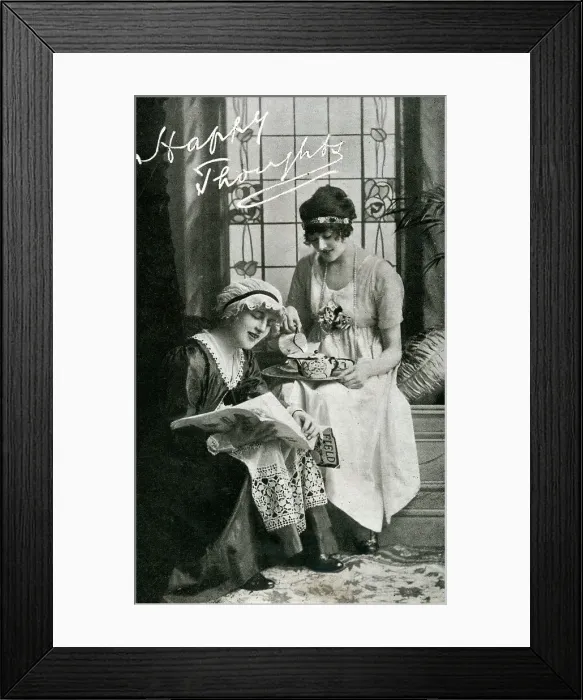 Framed Print : Two young ladies enjoying a cup of tea Framed Print : Two young ladies enjoying a cup of tea