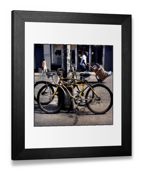 Framed Print : Bicycles and figures in New York Street, USA Framed Print : Bicycles and figures in New York Street, USA