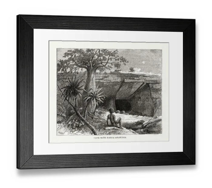 Framed Print : An aboriginal outside the entrance to a cave which is ornamented with religious artworks Date: circa 1860 Framed Print : An aboriginal outside the entrance to a cave which is ornamented with religious artworks Date: circa 1860