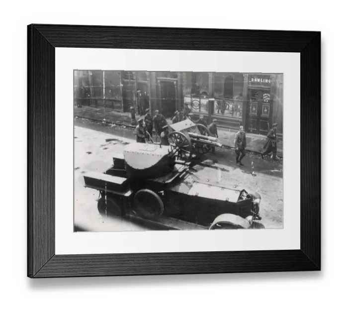 Framed Print : Easter Rising, 1916. Soldiers with gun and armoured car in the streets of Dublin outside Dowling or Dowling's pub. Date: 1916 Framed Print : Easter Rising, 1916. Soldiers with gun and armoured car in the streets of Dublin outside Dowling or Dowling's pub. Date: 1916