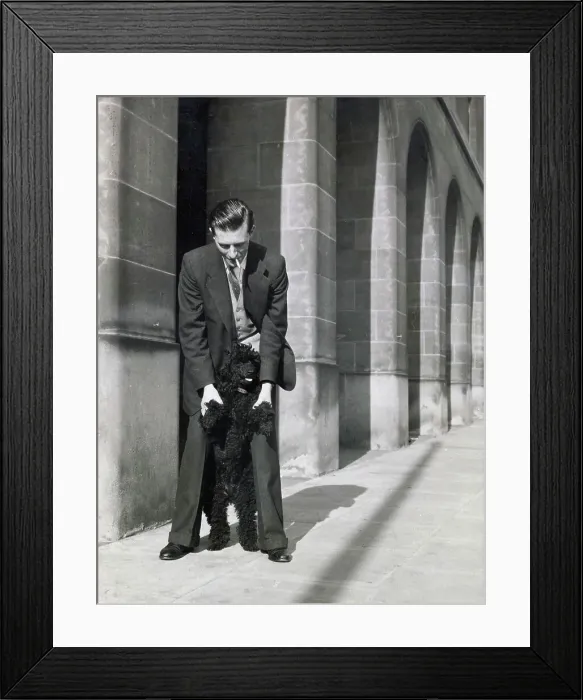 Framed Print : Alec Baker with the family pet poodle Framed Print : Alec Baker with the family pet poodle