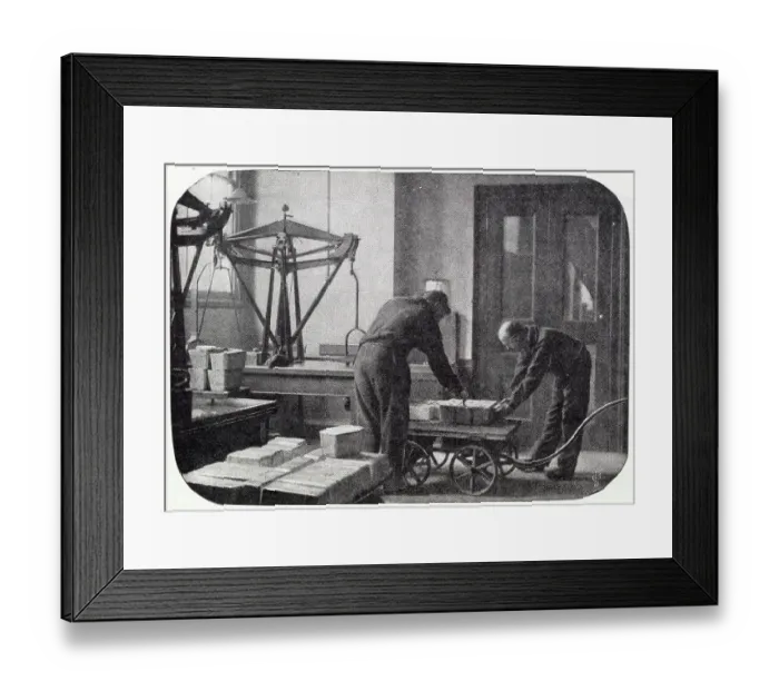 Framed Print : After the silver ingots had been weighed, they were marked and portioned out to the amount of alloy necessary to ensure that the result of the coins would be of the legal standard weight. Date: 1904 Framed Print : After the silver ingots had been weighed, they were marked and portioned out to the amount of alloy necessary to ensure that the result of the coins would be of the legal standard weight. Date: 1904