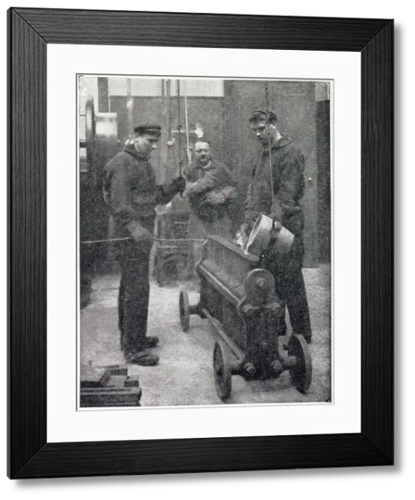 Framed Print : Moulders pouring hot liquid silver into long bars twenty inches long. Date: 1904 Framed Print : Moulders pouring hot liquid silver into long bars twenty inches long. Date: 1904