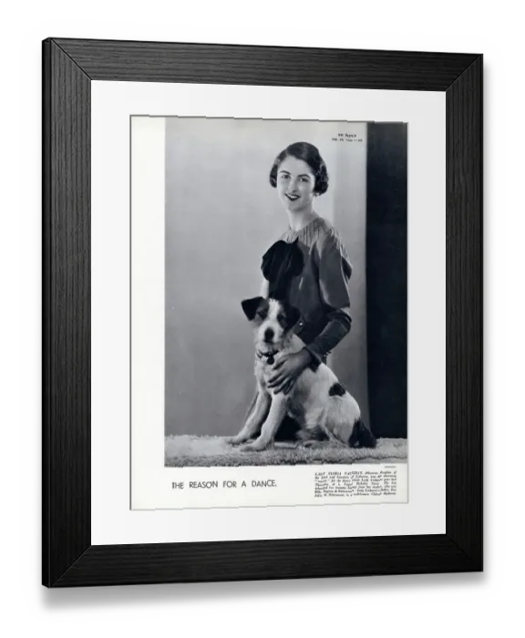 Framed Print : The reason for a dance. Lady Gloria Vaughan (pictured with her terrier) debutante daughter of the Earl and Countess of Lisburne, was the charming reason for the dance which Lady Lisburne gave at 5, Upper Berkeley Street. Date: 1934 Framed Print : The reason for a dance. Lady Gloria Vaughan (pictured with her terrier) debutante daughter of the Earl and Countess of Lisburne, was the charming reason for the dance which Lady Lisburne gave at 5, Upper Berkeley Street. Date: 1934