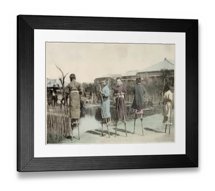 Framed Print : Japanese boys playing on bamboo stilts (bamboo horse) Date: circa 1890s Framed Print : Japanese boys playing on bamboo stilts (bamboo horse) Date: circa 1890s