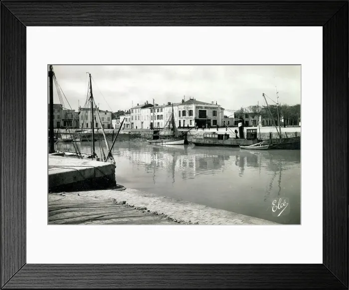 Framed Print : Port entrance and hotel, Ile de Re, Charente Maritime, France Date: circa 1930s Framed Print : Port entrance and hotel, Ile de Re, Charente Maritime, France Date: circa 1930s