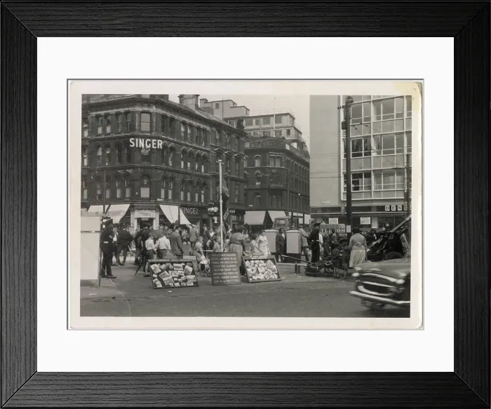 Framed Print : Corner of Market and Bridge Streets, Bradford, West Yorkshire, with Parkinson & Son sewing machines (Singer), Brown Muff & Co, Dentons, and a recruitment drive for the 45 Field Regiment Royal Artillery with a 25 pounder field gun (right) Framed Print : Corner of Market and Bridge Streets, Bradford, West Yorkshire, with Parkinson & Son sewing machines (Singer), Brown Muff & Co, Dentons, and a recruitment drive for the 45 Field Regiment Royal Artillery with a 25 pounder field gun (right)