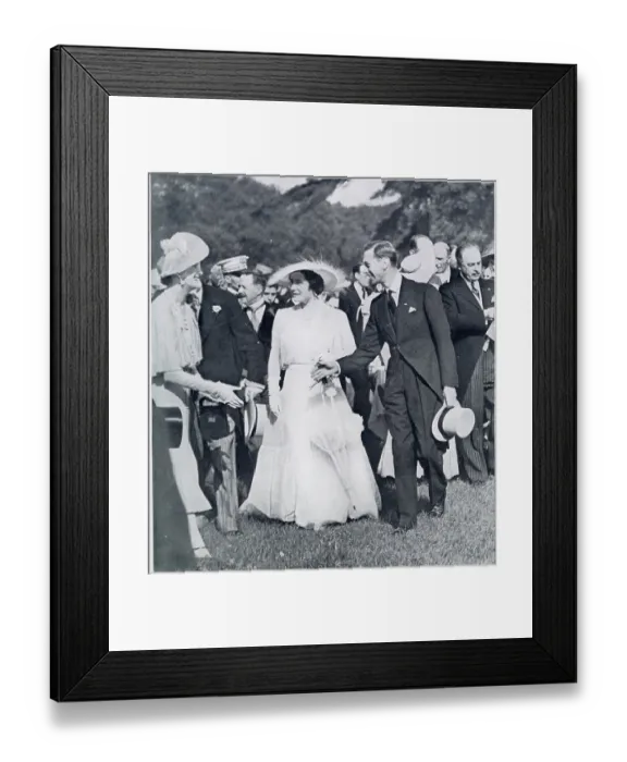 Framed Print : King George VI and Queen Elizabeth greeting a guest at a garden party held in their honour at the Bagatelle in the Bois de Boulogne Framed Print : King George VI and Queen Elizabeth greeting a guest at a garden party held in their honour at the Bagatelle in the Bois de Boulogne