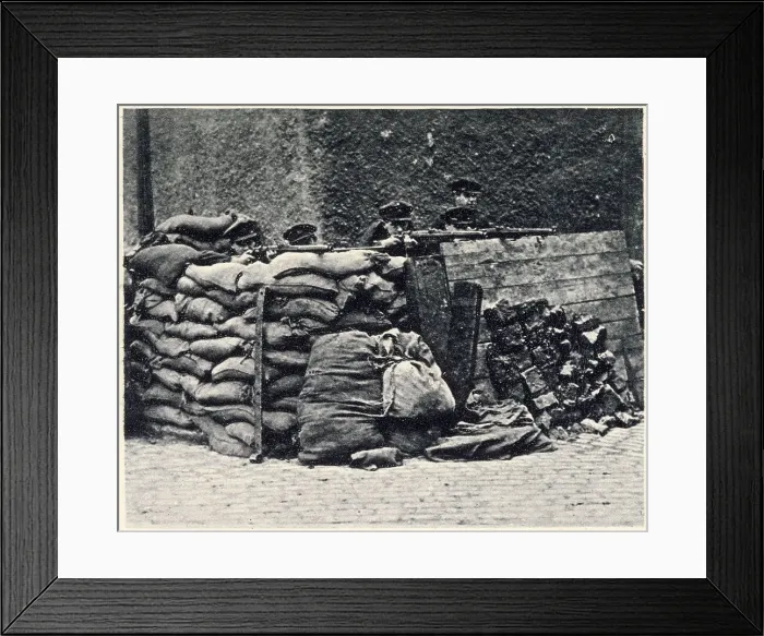 Framed Print : With rifles levelled ready for action. The Provisional Government was most anxious to avoid further bloodshed, photograph showing Governmen troops strongly barricated at a street corner. Date: 2nd July 1922 Framed Print : With rifles levelled ready for action. The Provisional Government was most anxious to avoid further bloodshed, photograph showing Governmen troops strongly barricated at a street corner. Date: 2nd July 1922