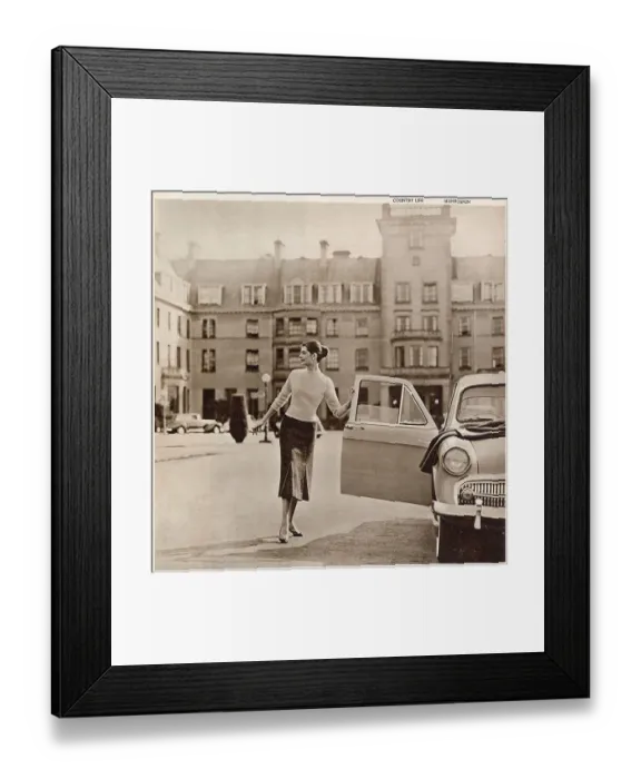 Framed Print : The Gleneagles Hotel - A glamorous model in trendy knitwear at the front of the hotel getting into her car. Date: 1956 Framed Print : The Gleneagles Hotel - A glamorous model in trendy knitwear at the front of the hotel getting into her car. Date: 1956