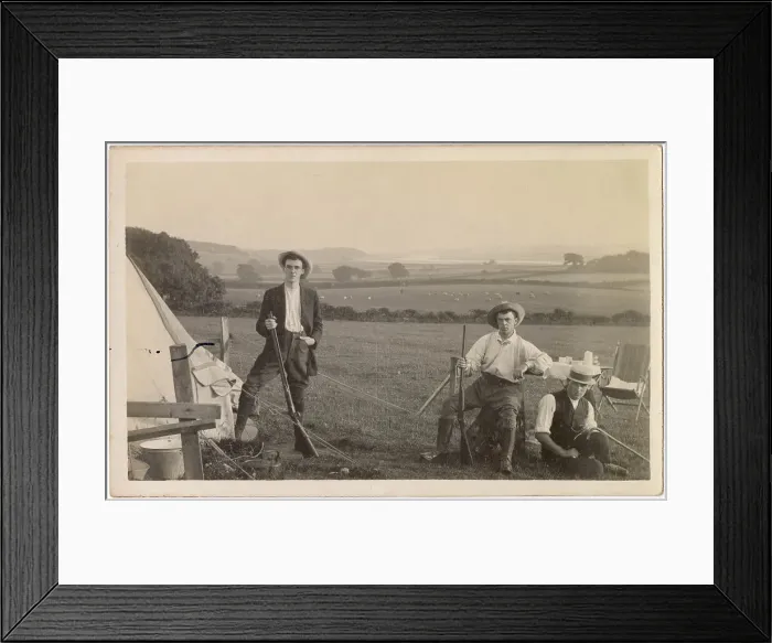 Framed Print : Three young men in a field beside a tent, two of them with rifles Date: circa 1910s Framed Print : Three young men in a field beside a tent, two of them with rifles Date: circa 1910s