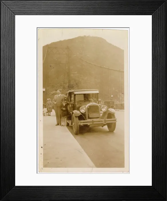 Framed Print : Bear Mountain Bridge on the Hudson River, New York State, USA - man and girl with a Hudson Essex 6 cylinder car (circa 1926). Date: 1927 Framed Print : Bear Mountain Bridge on the Hudson River, New York State, USA - man and girl with a Hudson Essex 6 cylinder car (circa 1926). Date: 1927