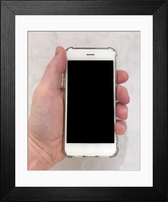 Framed Print : A hand holding a modern white touch-screen mobile smartphone with a clear case. Date: 2022 Framed Print : A hand holding a modern white touch-screen mobile smartphone with a clear case. Date: 2022