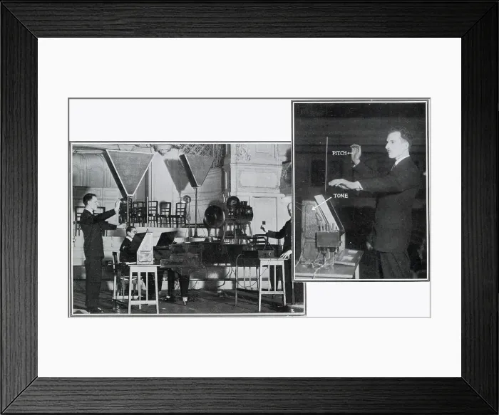 Framed Print : Leon Theremin (1896 - 1993) giving a demonstration of his electronic musical instrument to a group of invited Scientists (including Sir Oliver Lodge) at the Savoy Hotel and at an subsequently a concert at the Albert Hall (pictured) Framed Print : Leon Theremin (1896 - 1993) giving a demonstration of his electronic musical instrument to a group of invited Scientists (including Sir Oliver Lodge) at the Savoy Hotel and at an subsequently a concert at the Albert Hall (pictured)