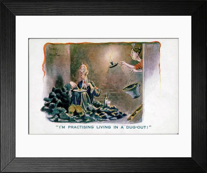 Framed Print : Comic postcard, Man eating meal in coal cellar - I'm practising living in a dug-out! A Derby Scheme armband on his jacket shows that he is signed up and ready for active service. Date: circa 1915 Framed Print : Comic postcard, Man eating meal in coal cellar - I'm practising living in a dug-out! A Derby Scheme armband on his jacket shows that he is signed up and ready for active service. Date: circa 1915