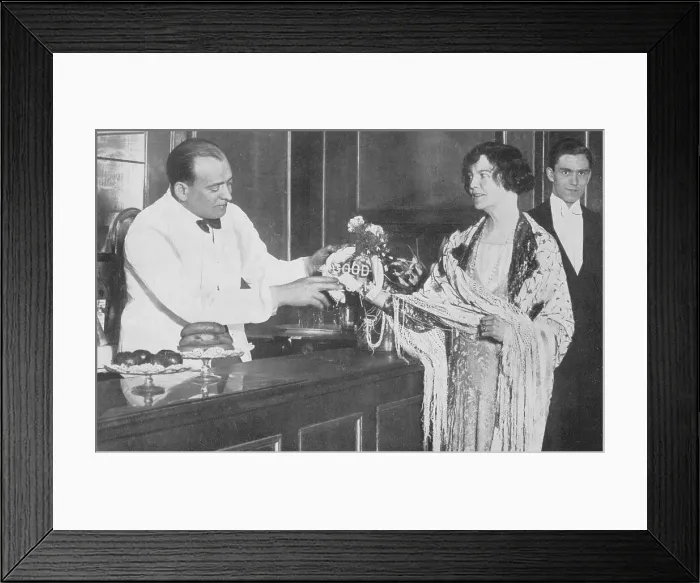 Framed Print : Kate Evelyn Ma Meyrick (1875 -1933), an Irish business woman and Queen of the London nightclub scene, pictured at the 43 with Hugo, the famous barman there Framed Print : Kate Evelyn Ma Meyrick (1875 -1933), an Irish business woman and Queen of the London nightclub scene, pictured at the 43 with Hugo, the famous barman there